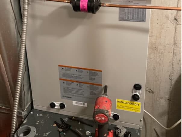 Residential HVAC unit installation in progress